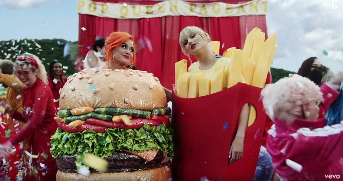 Katy Perry Taylor Swift Standing in a French Fry and Burger Costume During the You Need To Calm Down Music Video